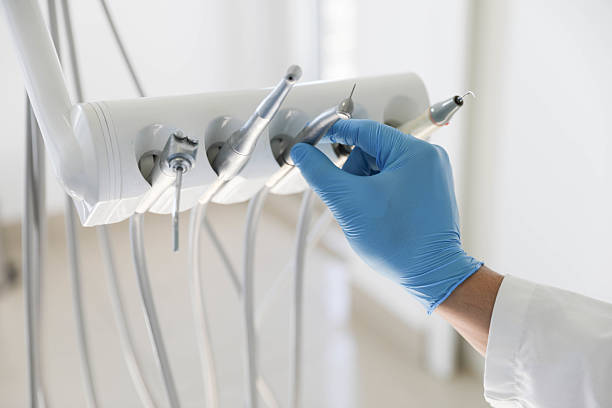 Professional Tooth Extraction technician working in Cotton County County, OK